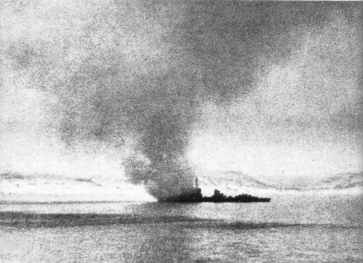 narvik5.jpg - Her guns silenced, and burning furiously, the destroyer drifted all through the night, lighting up the fiord. In the morning she sank.